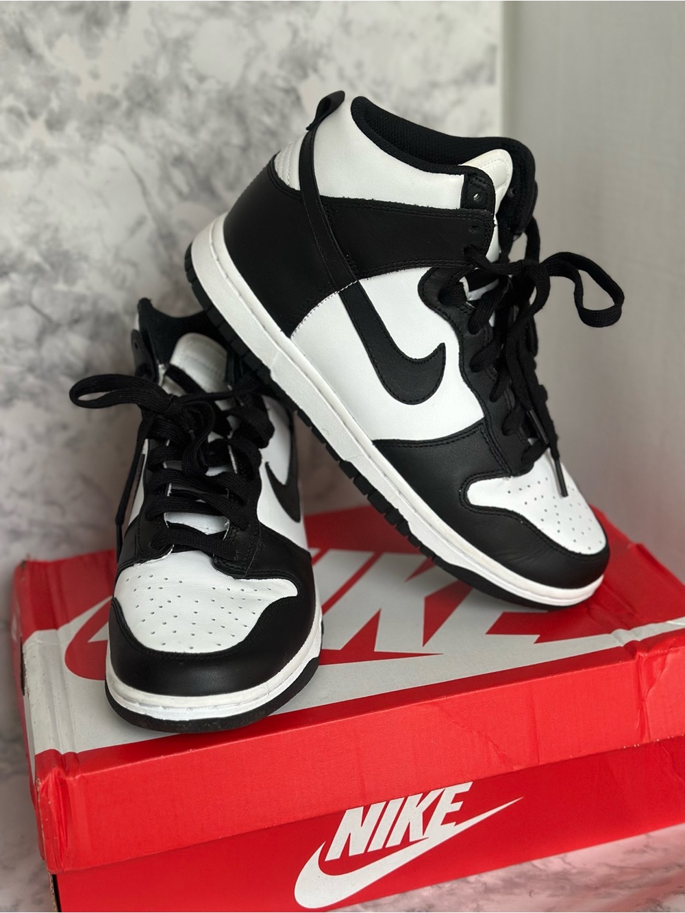 Nike Black and White Mid-Top Sneakers
